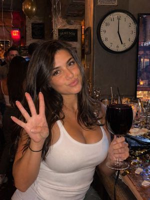 Candid Bar Photo with Four Fingers